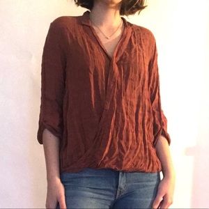 Coral Wrap Blouse with one hidden button.